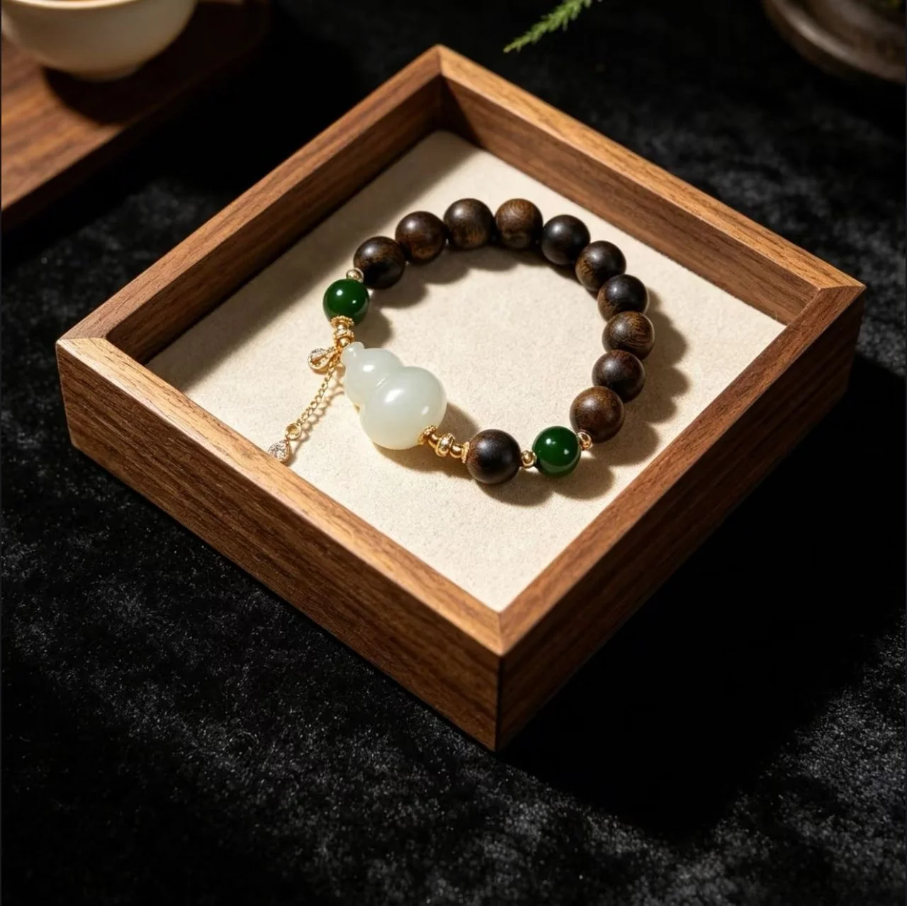 Agarwood bracelet with Hetian jade gourd in wooden display box